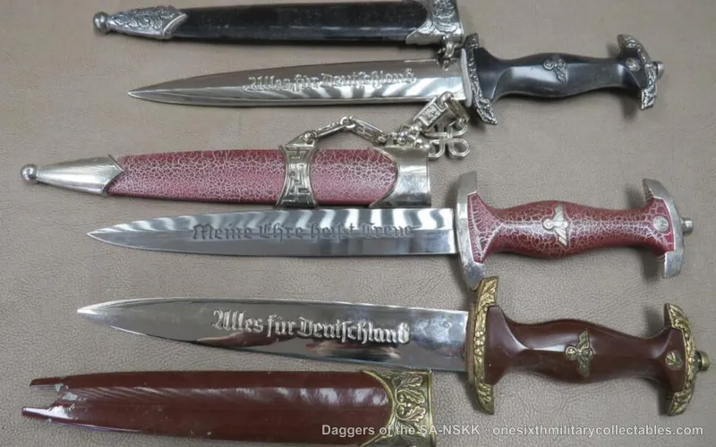 Three reproduction SA-style daggers